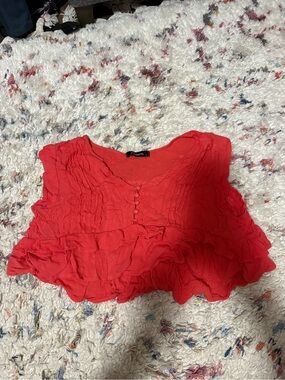 Coral Ruffled Sleeveless Crop Top